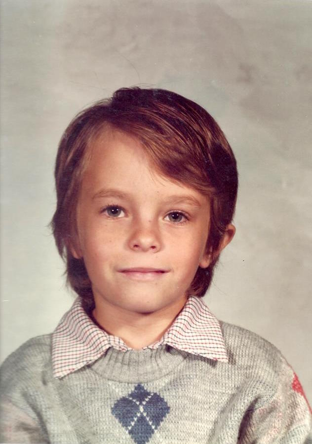 Photograph of Daniel as a child in first grade