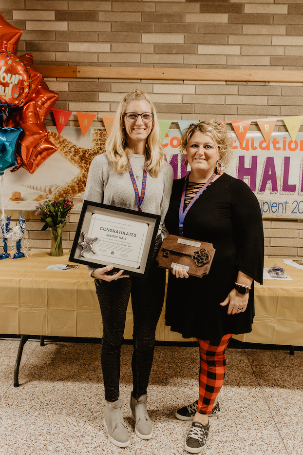 Starfish award winner, Mandy Hall, with her sister who is also her SLPA