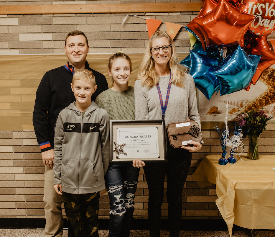 Starfish award winner, Mandy Hall, with her husband, son, and daughter. 